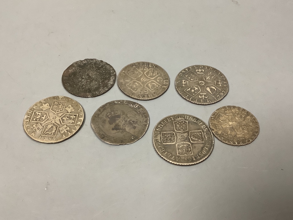 Six 18th century shillings and a sixpence